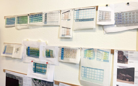 An image of the work from the on Blue Room House One charette as it hangs on the walls of Studio K2 Architecture.